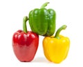 Three colored peppers on white background Royalty Free Stock Photo
