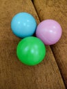Three colored plastic balls Royalty Free Stock Photo