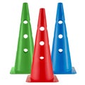 Three colored sports cones, red, blue and green, stand on a white background Royalty Free Stock Photo