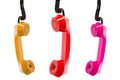 Three colored telephone receivers Royalty Free Stock Photo