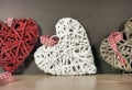 Three colored weaved hearts Royalty Free Stock Photo