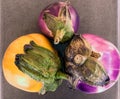 Three colorful aubergines eggplant Royalty Free Stock Photo