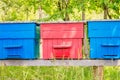 Three Colorful Beehives Royalty Free Stock Photo