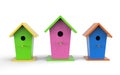 Three colorful birdhouses on a white background