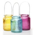 Three colorful candle lampoon