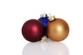 Three colorful christmas ornaments Royalty Free Stock Photo