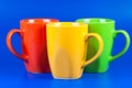 Three colorful cups