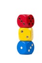 Three colorful dice in primary colors stacked on each other isolated on white background showing numbers one, two, three Royalty Free Stock Photo