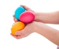 Three colorful easter eggs in child hands Royalty Free Stock Photo