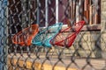 Three colorful garden chairs on a verandah Royalty Free Stock Photo