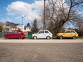 Three colorful mini cars parked one after the other Model: Fiat 126 aflso known as Polski Fiat 126p Royalty Free Stock Photo