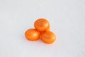 Three Colorful orange Easter eggs Royalty Free Stock Photo