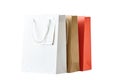 Three colorful paper shopping bag isolated on a white background Royalty Free Stock Photo