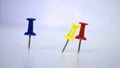 Three colorful pushpins on white background Royalty Free Stock Photo