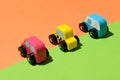 Three colorful rustic wooden handcrafted toy cars Royalty Free Stock Photo