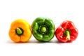 Three colors of bell peppers, yellow, green, red isolated on a white background. Royalty Free Stock Photo