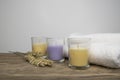 Three coloured candles with white towels Royalty Free Stock Photo