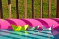 Colourful toy paper boats floating in the water