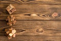 Three complex wooden puzzles or brainteasers Royalty Free Stock Photo