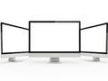 Three computer monitors isolated on white background Royalty Free Stock Photo