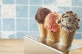 Three cones of assorted ice cream in a holder Royalty Free Stock Photo