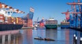 Three container ships in the harbour of Hamburg, Germany Royalty Free Stock Photo