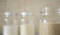 Three containers with breadcrumbs, flour, semolina