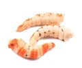 Three cooked unshelled tiger shrimps.