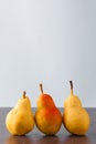 Three corella pears vertical Royalty Free Stock Photo