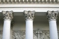 Three corinthian columns supporting the cornice of the church Royalty Free Stock Photo