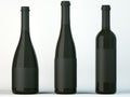 Three corked bottles for wine with black labels Royalty Free Stock Photo