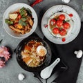 Three-course business lunch. cherry tomatoes with tofu mousse, thai rice with chicken and vegetables, asian noodle soup, ramen