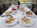 Three course meals in an a la carte restaurant Royalty Free Stock Photo