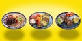 Three courses: with sliced meat, grilled vegetables and barbecue meat on a yellow isolated background. The concept of restaurant s Royalty Free Stock Photo