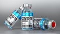 Three covid-19 / SARS-CoV-2 / coronavirus vaccine ampoules isolated on grey background