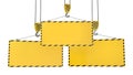 Three crane hooks with blank yellow plates