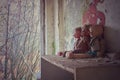 Three creepy dolls grow cobwebs in the Chernobyl exclusion zone Royalty Free Stock Photo