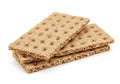 Three crispbread crackers with a textured surface stacked on a white background isolated on white background Royalty Free Stock Photo