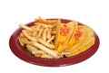 Three crispy tacos on a red plate with french fries, isolated