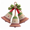 Three Crocheted Christmas Bells Ornament with Bow and Ribbons on White Background Royalty Free Stock Photo