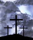 The three crosses of the crucifixion of Jesus Christ  are seen in silhouettes Royalty Free Stock Photo