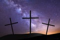 Three crosses on hill top with milky way in background Royalty Free Stock Photo