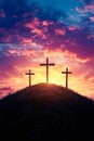 Three crosses on top of a hill at sunset Royalty Free Stock Photo