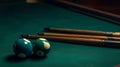 Three cues and three billiard balls on a game table