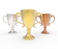 Three cup trophies, gold, silver and bronze Royalty Free Stock Photo