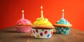 Three cupcake with candles Royalty Free Stock Photo
