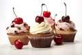 Three cupcakes with cherries on top of them. AI generative image.