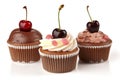 Three cupcakes with chocolate frosting and cherries on top. AI generative image.