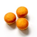 Three cupcakes with different fillings, top view, on a white background
