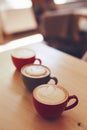 Three cups of cappuccino Royalty Free Stock Photo